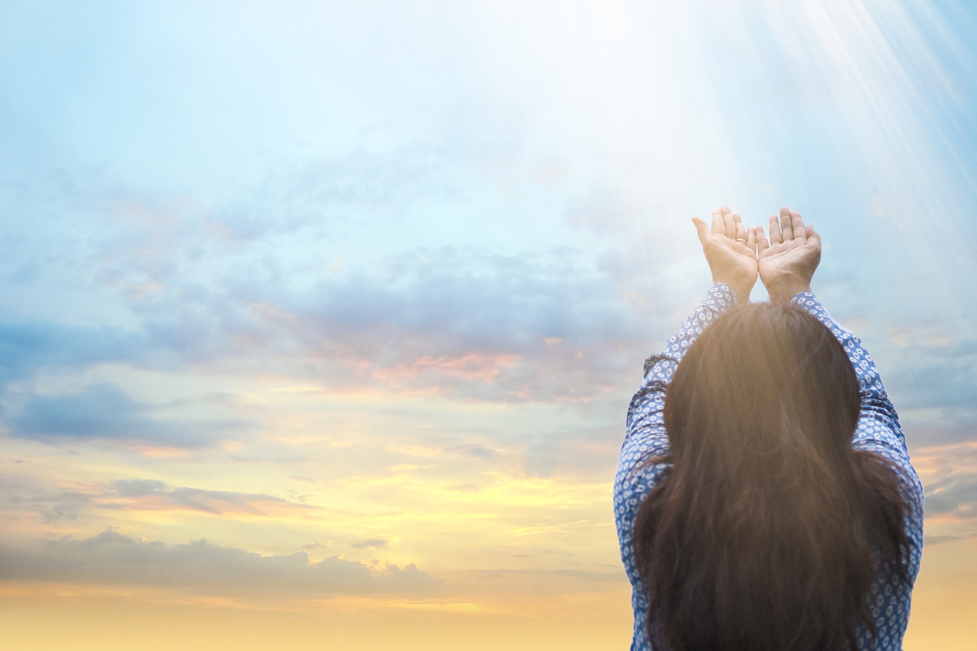 Girl praying and worship to GOD
