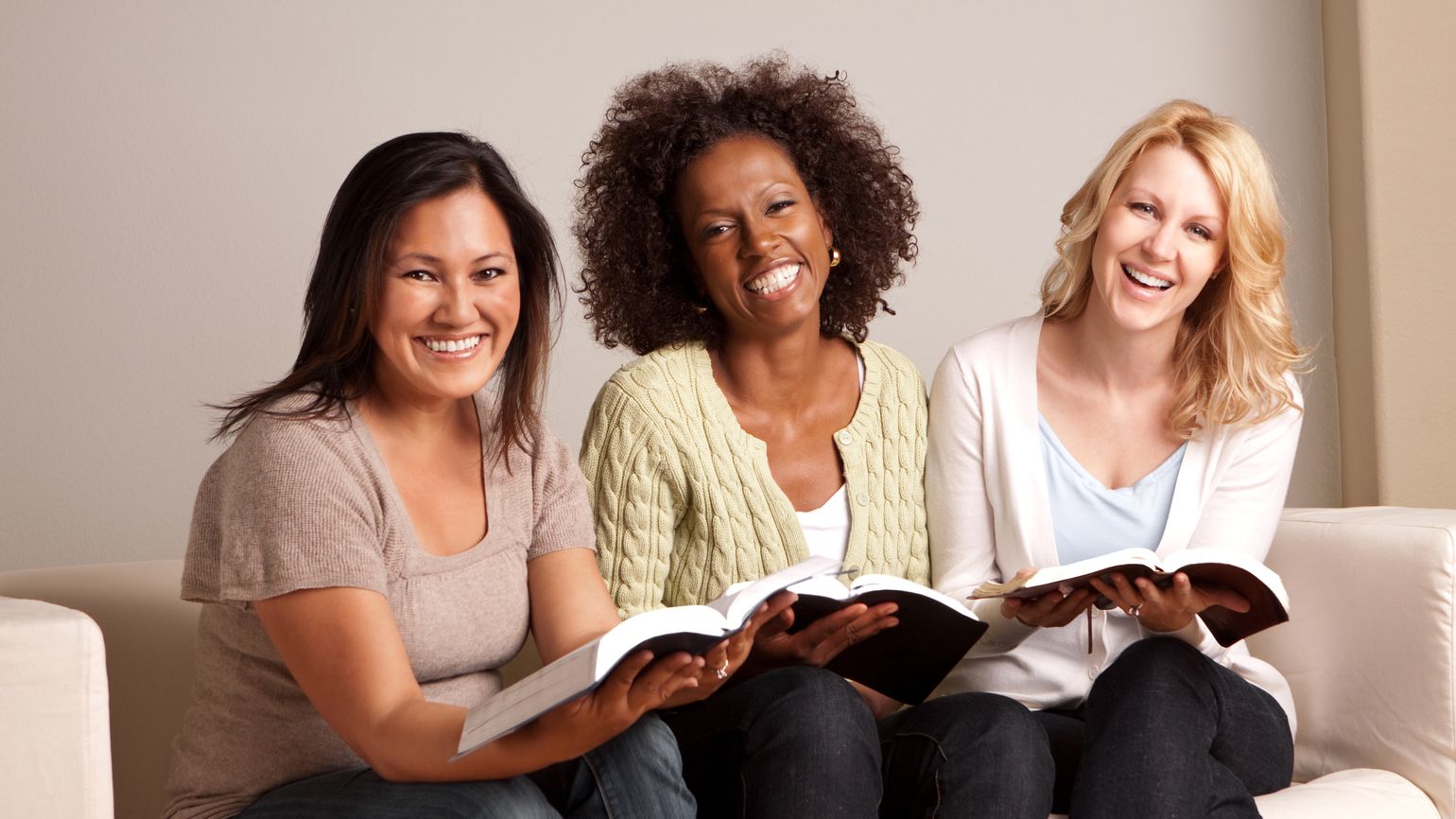 Women studying the bible together